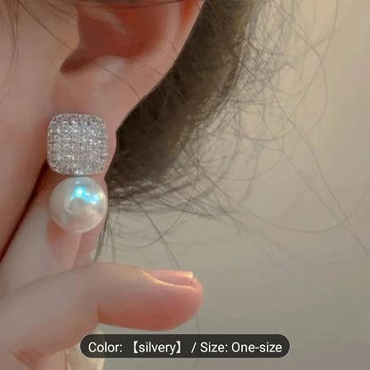 1 Pair of Luxury Women's Earrings.